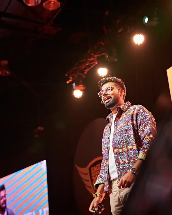 Tushar Gaur presenting on stage