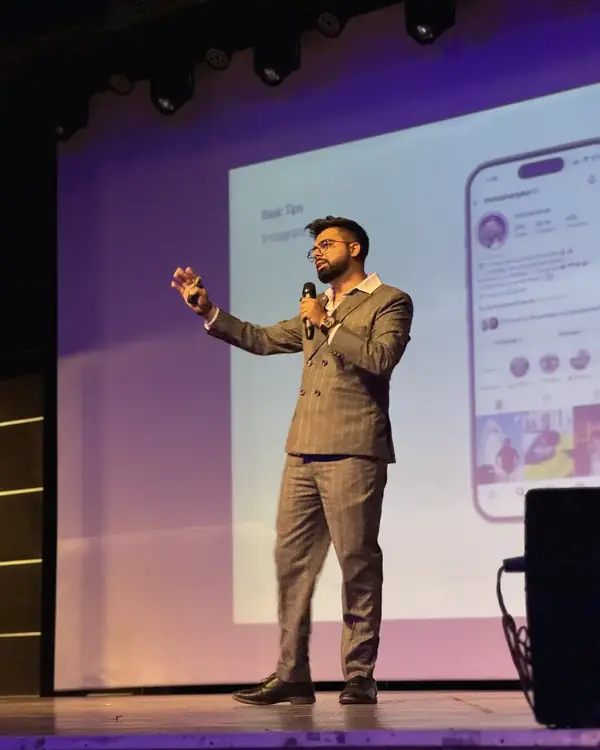 Tushar Gaur speaking on stage